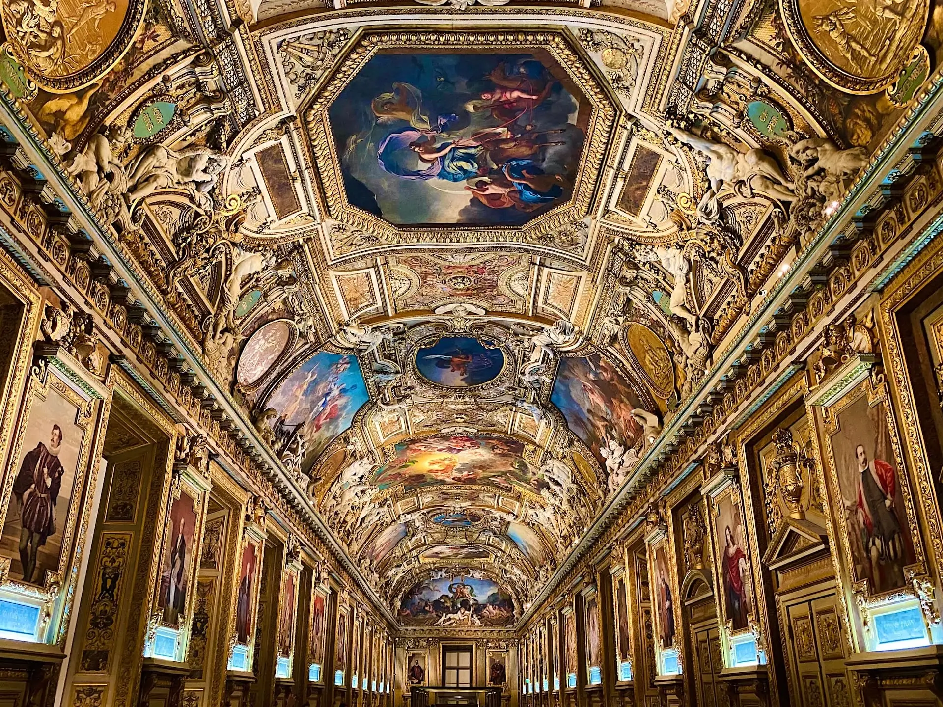 Ceiling with paintings and gilding in the Louvre
