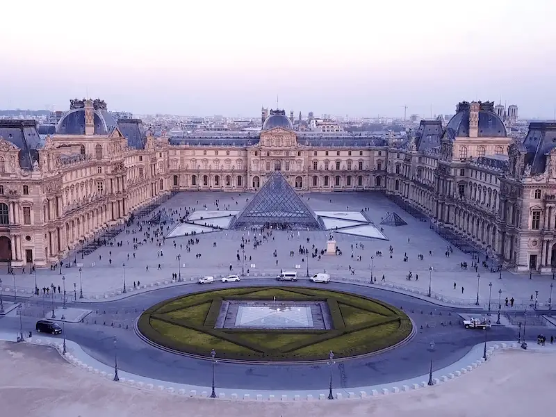 Visit the Louvre Panoramic view of the Louvre with its glass pyramid