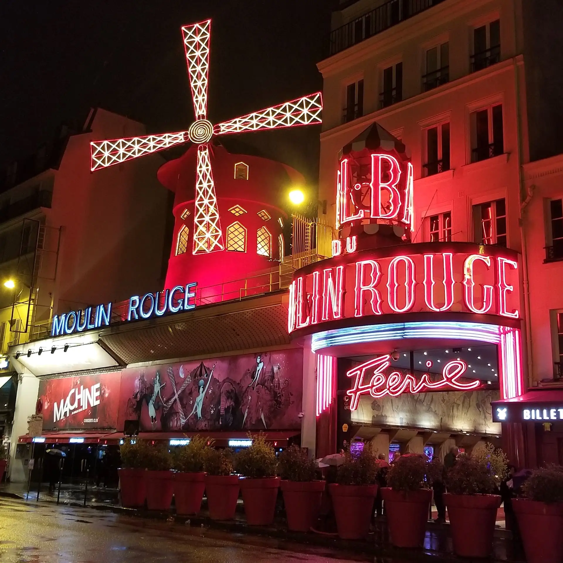 Moulin Rouge facade at night in Paris
