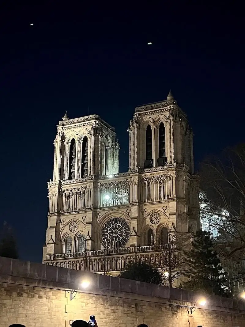 Notre-Dame de Paris at night Facade of Notre-Dame de Paris at night