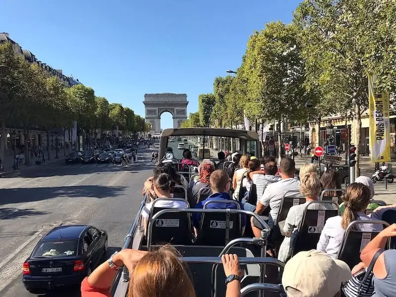 Paris tourist bus Interior of a bus with passengers on the Champs-Élysées