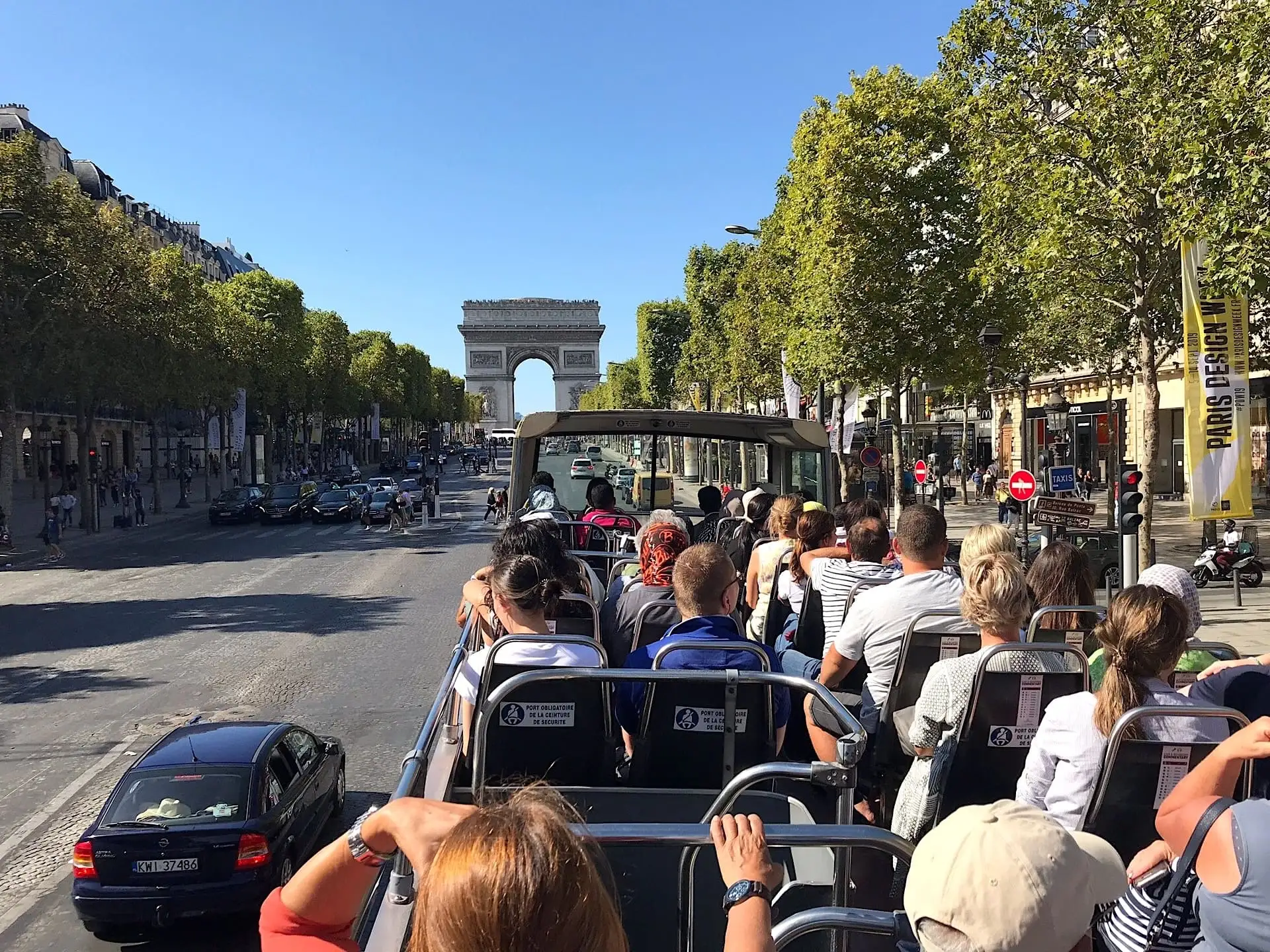 Interior of a bus with passengers on the Champs-Élysées