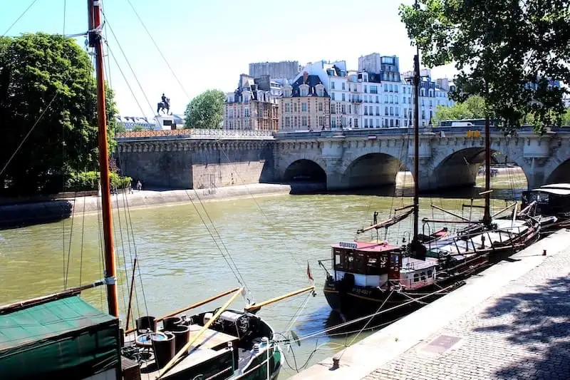 Pont neuf Paris Pont Neuf overlooking the Seine with a barge